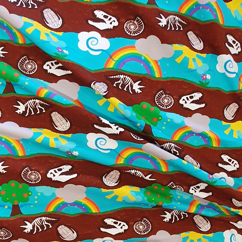 
                      
                        Fabric Mama Beneath our feet Dino Bones Organic Cotton Lycra Jersey Knit Fabric
                      
                    