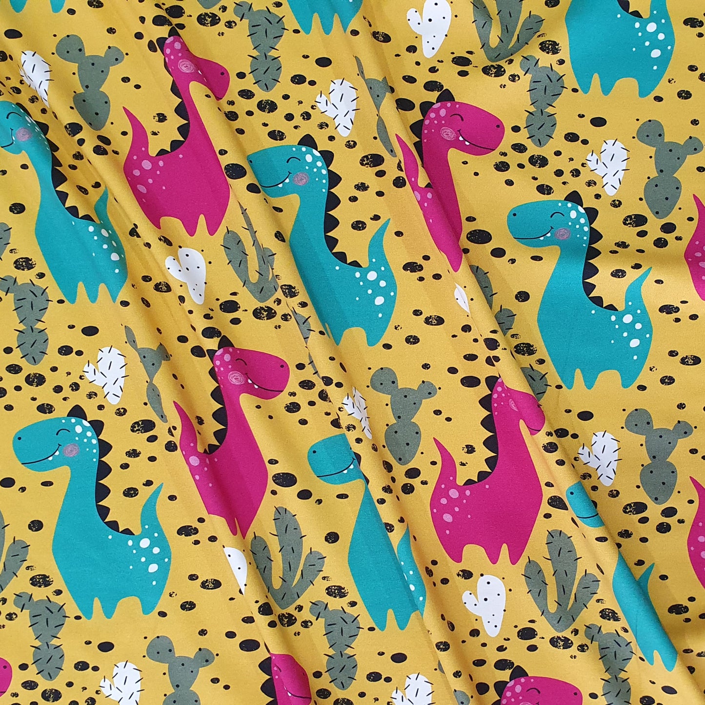 Tygdrommar Dinosaur Yellow Organic Cotton Knit Fabric Australia